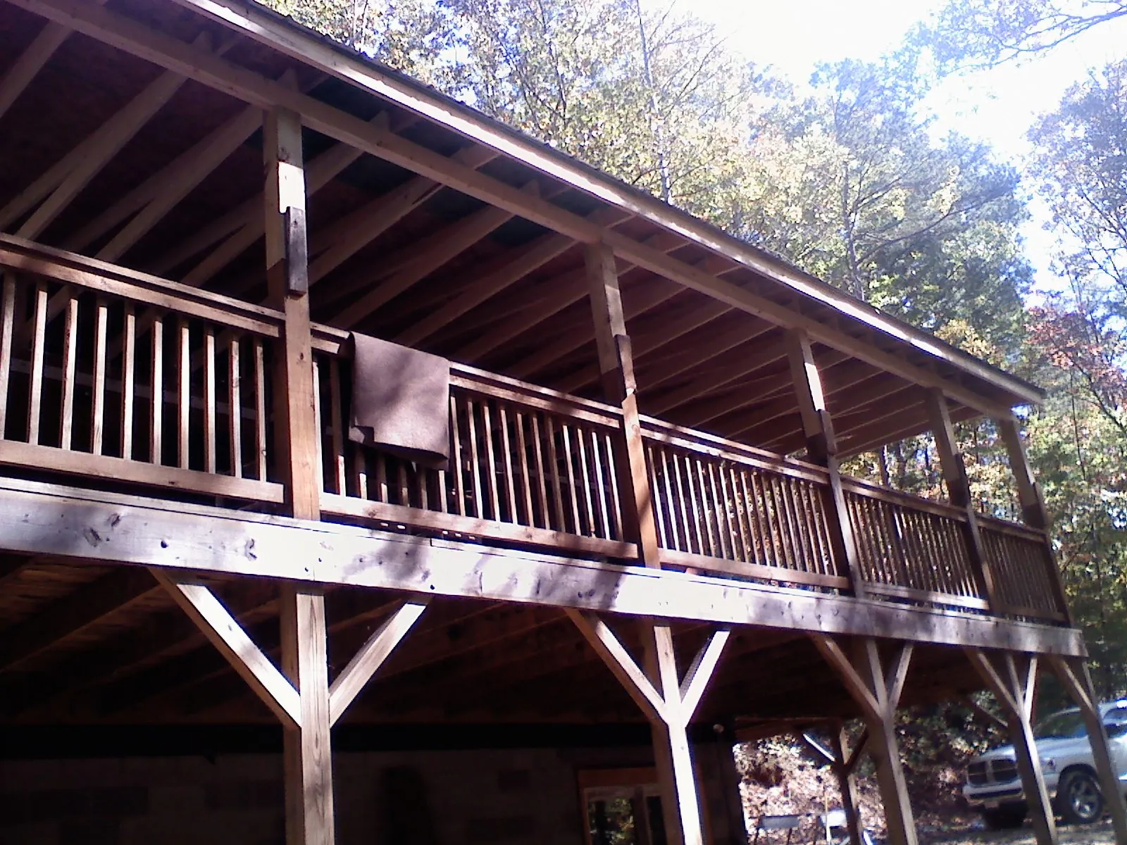 Timber framing under a new elevated porch and deck — Roof Leak Repair in Herriman by Roofing Brothers